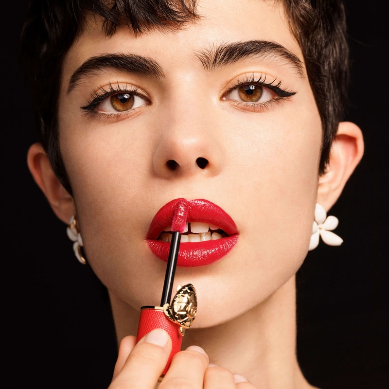 Model using liquid lipstick vinyl
