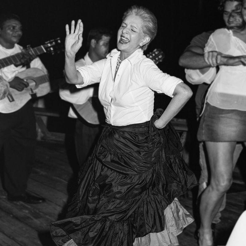 Carolina Herrera dancing in New York at a social event